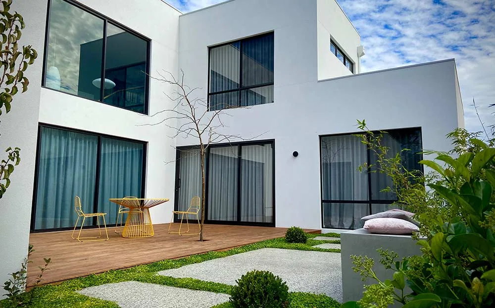 Modern Brighton home with a timber deck and outdoor dining area